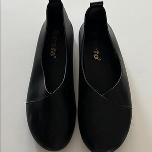 Women's black leather slip on flats